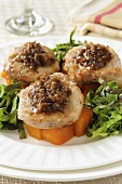 Pork medallions on pumpkin with beer and onion sauce