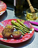 Grilled, marinated onions and green asparagus
