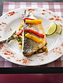 Sea bass on courgettes and peppers