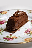 Small chocolate cake with cocoa powder