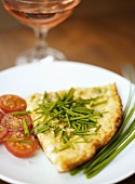 Cheese frittata with chives and tomatoes
