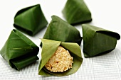 Sticky rice with coconut milk & sesame in banana leaf (Thailand)