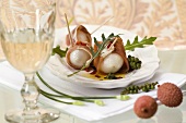 Ham-wrapped lychees with green peppercorns