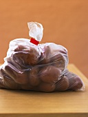 Red-skinned potatoes in a plastic bag