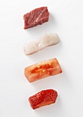 Raw meat, fish, tomato and strawberry