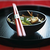 A bowl of Japanese vegetable soup with mushrooms