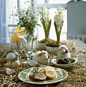 Beef roulade with napkin dumpling on decorated Easter table