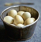 Pheasant's eggs in a metal bowl