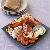 Seafood platter with mayonnaise and lemon