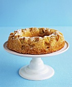 Apple ring cake on a cake stand