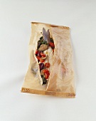 Sea bass and vegetables baked en papillote