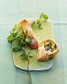 Fried salmon with courgettes & soft cheese in filo pastry nest