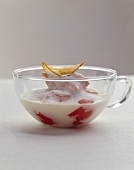 Cream of potato soup with salmon trout and milk foam