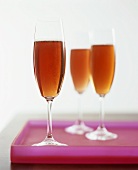 Three glasses of sparkling wine cocktail