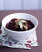 Beetroot soup with sirloin steak and horseradish cream