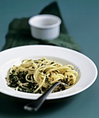 Spaghetti with kale, capers, gherkin, olives, shallots