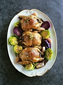 Stuffed quail on cabbage