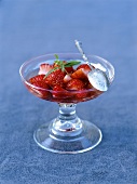 Strawberry salad with verbena in trifle glass