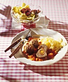 Stuffed meatballs with tomatoes and pasta