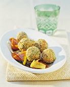 Sesame-coated rice balls with vegetables