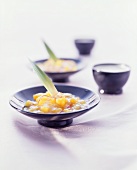 Orange jelly with pineapple in two dishes