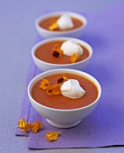 Cold red pepper soup with tequila, soft cheese, marigold petals