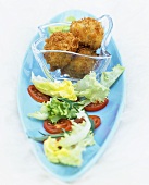 Deep-fried mozzarella with salad