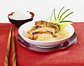 Chicken breast with peanut sauce and rice