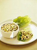 Chopped chicken with mushrooms and lettuce leaves