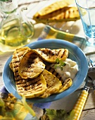 Grilled yellow courgettes with sour cream