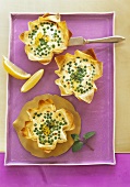 Yufka pastry baskets filled with ricotta and peas