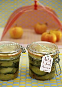 Minted apple relish in two preserving jars