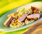 Barley risotto with physalis and fried salmon