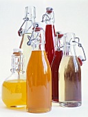 Various syrups in flip-top bottles