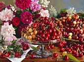 Cherries on a cake stand with roses