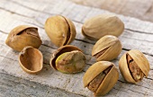 Pistachios on wooden background