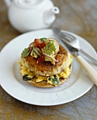 Chicken burger with scrambled egg on bread roll