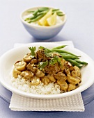 Veal and mushrooms on rice