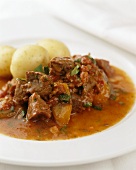 Beef goulash with tomatoes and potatoes