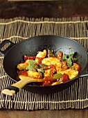 Chicken and peppers in wok