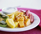 Fruit salad with rum and almonds