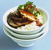 Pork on rice with chilli sauce