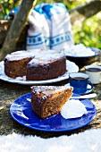 A slice of pear and chocolate cake with whipped cream