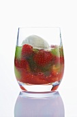 Olive ice cream with herb jelly and strawberries