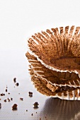 Paper cases with the remains of chocolate muffins