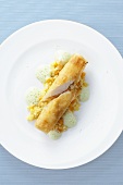 Halibut in puff pastry with pumpkin pearl barley and green curry foam