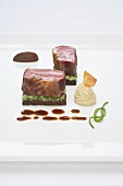 Saddle of lamb on lamb knuckle confit with bean puree