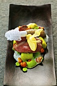Pigeon with pea gnocchi, chanterelle mushrooms and parsley root foam