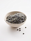 A bowl of green puy lentils