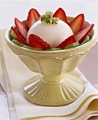 Yoghurt panna cotta with kiwi fruit and strawberries